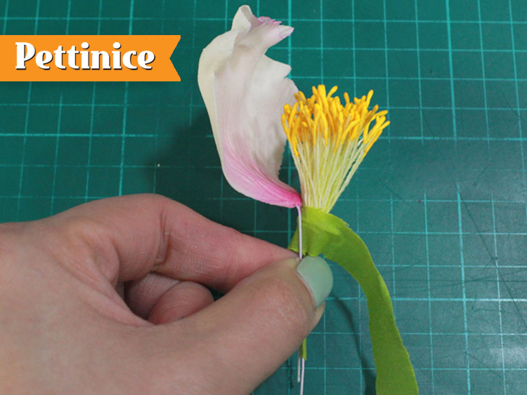 11. Start assembling, the first petal to be on the same height with the floral tape