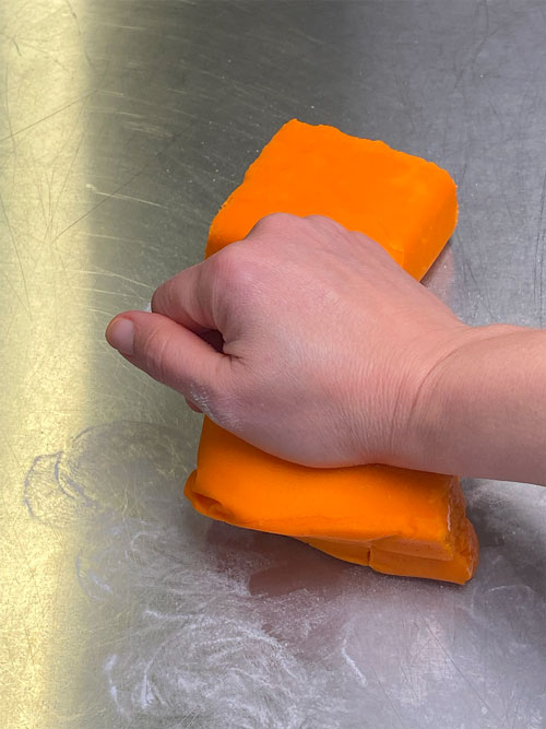 Knead orange Pettinice, I use Snowhip or canola spray on the bench to prevent it sticking