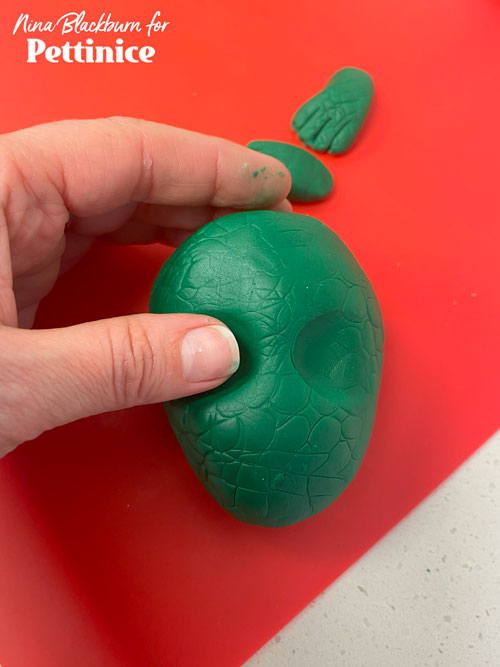 Imprint the egg shape with the same mat used for the body.  Press to define the eyes with your thumb.