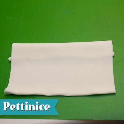 With the folded edge facing up, bring the rectangle towards you creating a 1cm fold as shown above.