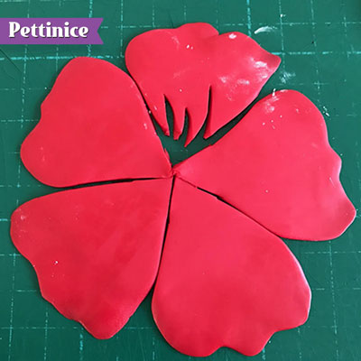 Make jagged cuts at the edge as shown - from ¼ of the way up the petal.