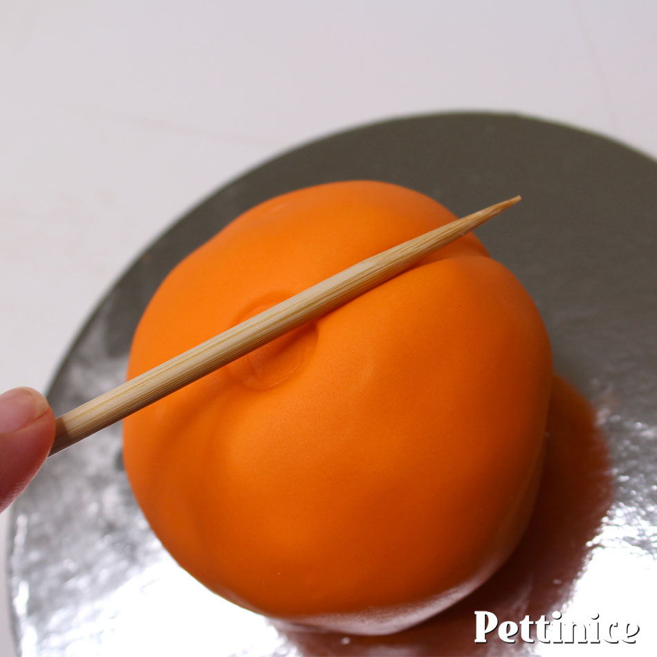 Use a toothpick to emboss pumpkin segments