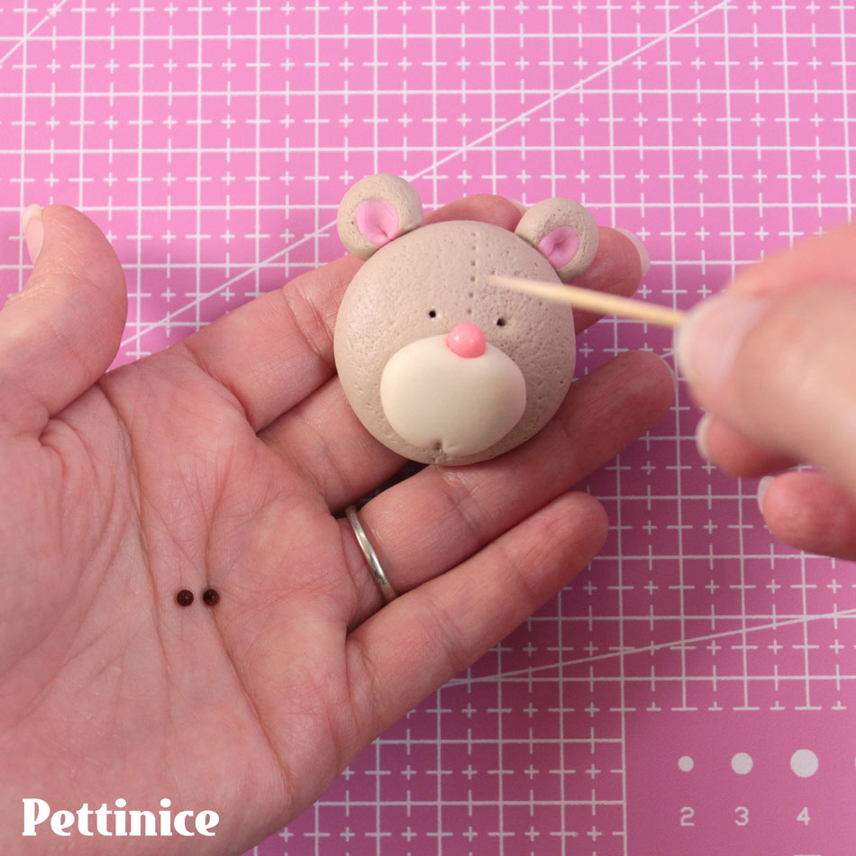 Use your toothpick to create a guide for your Chocolate fondant eyes.