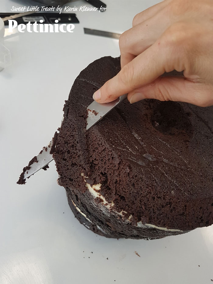 Trim around the fattest part of the cake as well.