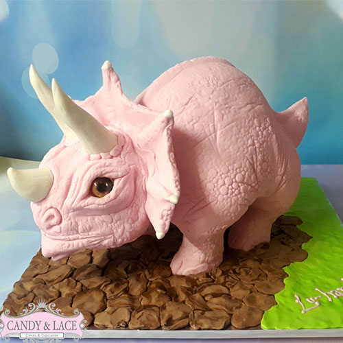 Pink dinosaur cake