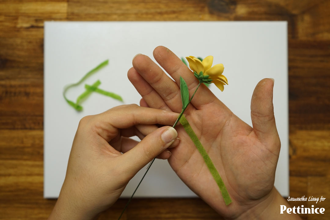 Place your leaf in the desired spot and tape into place.